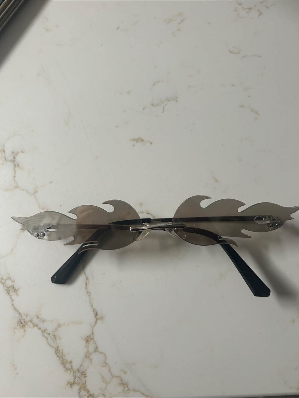 Flame Rimless Sunglasses in Silver